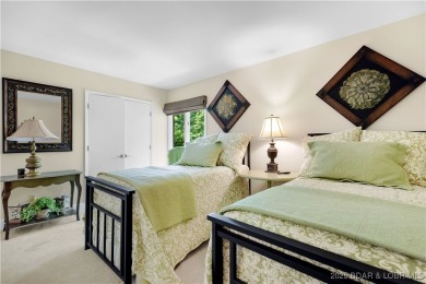 This charming 2,397 sq ft lakefront home in Tan-Tar-A Estates on The Oaks Golf Course in Missouri - for sale on GolfHomes.com, golf home, golf lot