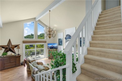 This charming 2,397 sq ft lakefront home in Tan-Tar-A Estates on The Oaks Golf Course in Missouri - for sale on GolfHomes.com, golf home, golf lot