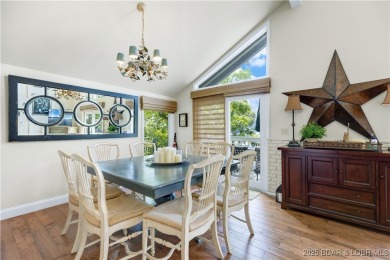 This charming 2,397 sq ft lakefront home in Tan-Tar-A Estates on The Oaks Golf Course in Missouri - for sale on GolfHomes.com, golf home, golf lot