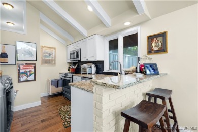 This charming 2,397 sq ft lakefront home in Tan-Tar-A Estates on The Oaks Golf Course in Missouri - for sale on GolfHomes.com, golf home, golf lot