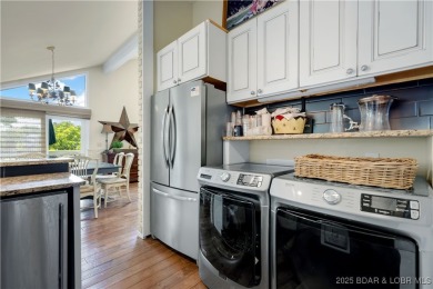 This charming 2,397 sq ft lakefront home in Tan-Tar-A Estates on The Oaks Golf Course in Missouri - for sale on GolfHomes.com, golf home, golf lot