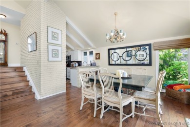 This charming 2,397 sq ft lakefront home in Tan-Tar-A Estates on The Oaks Golf Course in Missouri - for sale on GolfHomes.com, golf home, golf lot