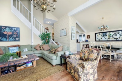 This charming 2,397 sq ft lakefront home in Tan-Tar-A Estates on The Oaks Golf Course in Missouri - for sale on GolfHomes.com, golf home, golf lot