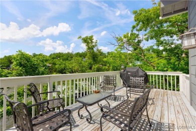 This charming 2,397 sq ft lakefront home in Tan-Tar-A Estates on The Oaks Golf Course in Missouri - for sale on GolfHomes.com, golf home, golf lot