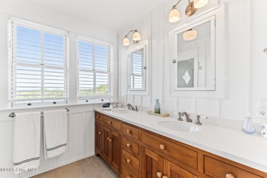 5BR/5.5BA Seaside luxury retreat redefines coastal living! on Bald Head Island Golf Club in North Carolina - for sale on GolfHomes.com, golf home, golf lot