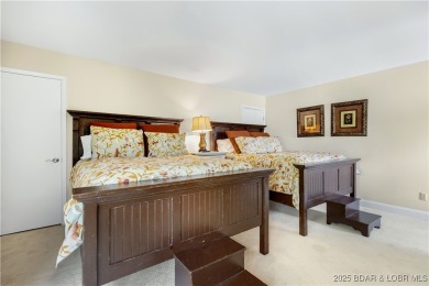 This charming 2,397 sq ft lakefront home in Tan-Tar-A Estates on The Oaks Golf Course in Missouri - for sale on GolfHomes.com, golf home, golf lot