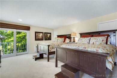This charming 2,397 sq ft lakefront home in Tan-Tar-A Estates on The Oaks Golf Course in Missouri - for sale on GolfHomes.com, golf home, golf lot