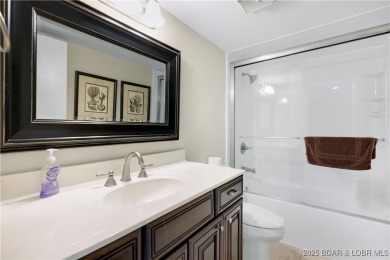 This charming 2,397 sq ft lakefront home in Tan-Tar-A Estates on The Oaks Golf Course in Missouri - for sale on GolfHomes.com, golf home, golf lot
