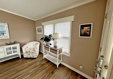 Updated 2/bd2/ba home offers an ideal blend of elegance & on Del Tura Golf and Country Club in Florida - for sale on GolfHomes.com, golf home, golf lot