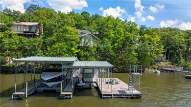 This charming 2,397 sq ft lakefront home in Tan-Tar-A Estates on The Oaks Golf Course in Missouri - for sale on GolfHomes.com, golf home, golf lot