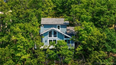 This charming 2,397 sq ft lakefront home in Tan-Tar-A Estates on The Oaks Golf Course in Missouri - for sale on GolfHomes.com, golf home, golf lot