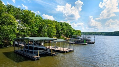 This charming 2,397 sq ft lakefront home in Tan-Tar-A Estates on The Oaks Golf Course in Missouri - for sale on GolfHomes.com, golf home, golf lot