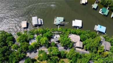 This charming 2,397 sq ft lakefront home in Tan-Tar-A Estates on The Oaks Golf Course in Missouri - for sale on GolfHomes.com, golf home, golf lot