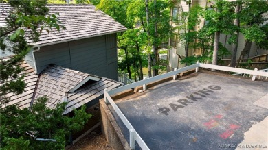 This charming 2,397 sq ft lakefront home in Tan-Tar-A Estates on The Oaks Golf Course in Missouri - for sale on GolfHomes.com, golf home, golf lot