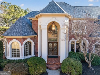 Stunning luxury home located in the prestigious, gated Sugarloaf on TPC At Sugarloaf Golf Club in Georgia - for sale on GolfHomes.com, golf home, golf lot