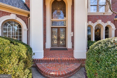 Stunning luxury home located in the prestigious, gated Sugarloaf on TPC At Sugarloaf Golf Club in Georgia - for sale on GolfHomes.com, golf home, golf lot