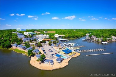 This charming 2,397 sq ft lakefront home in Tan-Tar-A Estates on The Oaks Golf Course in Missouri - for sale on GolfHomes.com, golf home, golf lot