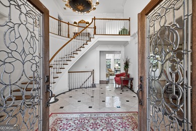 Stunning luxury home located in the prestigious, gated Sugarloaf on TPC At Sugarloaf Golf Club in Georgia - for sale on GolfHomes.com, golf home, golf lot