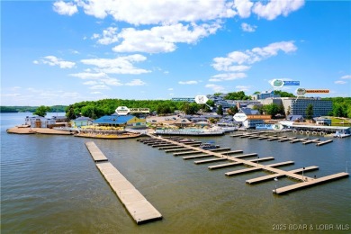 This charming 2,397 sq ft lakefront home in Tan-Tar-A Estates on The Oaks Golf Course in Missouri - for sale on GolfHomes.com, golf home, golf lot