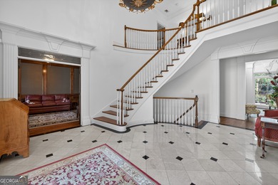 Stunning luxury home located in the prestigious, gated Sugarloaf on TPC At Sugarloaf Golf Club in Georgia - for sale on GolfHomes.com, golf home, golf lot