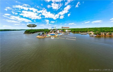 This charming 2,397 sq ft lakefront home in Tan-Tar-A Estates on The Oaks Golf Course in Missouri - for sale on GolfHomes.com, golf home, golf lot