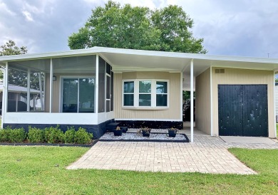 This home at the Fairways Country Club has a beautiful golf on Fairways Country Club in Florida - for sale on GolfHomes.com, golf home, golf lot