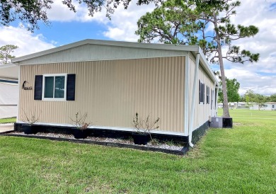 This home at the Fairways Country Club has a beautiful golf on Fairways Country Club in Florida - for sale on GolfHomes.com, golf home, golf lot