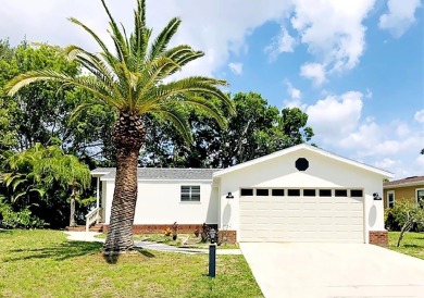 What a show stopper! Stunning 2bd/2/ba home enjoyed a total on Del Tura Golf and Country Club in Florida - for sale on GolfHomes.com, golf home, golf lot