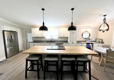 What a show stopper! Stunning 2bd/2/ba home enjoyed a total on Del Tura Golf and Country Club in Florida - for sale on GolfHomes.com, golf home, golf lot