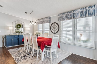 Welcome home to this beautifully updated 2-bedroom, 2-bath on Lake Henry Golf Club in Florida - for sale on GolfHomes.com, golf home, golf lot