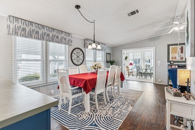 Welcome home to this beautifully updated 2-bedroom, 2-bath on Lake Henry Golf Club in Florida - for sale on GolfHomes.com, golf home, golf lot