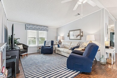 Welcome home to this beautifully updated 2-bedroom, 2-bath on Lake Henry Golf Club in Florida - for sale on GolfHomes.com, golf home, golf lot