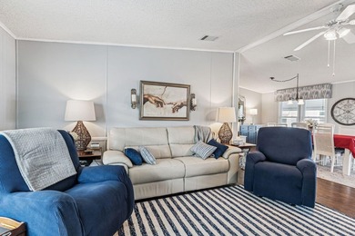 Welcome home to this beautifully updated 2-bedroom, 2-bath on Lake Henry Golf Club in Florida - for sale on GolfHomes.com, golf home, golf lot