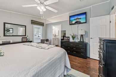 Welcome home to this beautifully updated 2-bedroom, 2-bath on Lake Henry Golf Club in Florida - for sale on GolfHomes.com, golf home, golf lot
