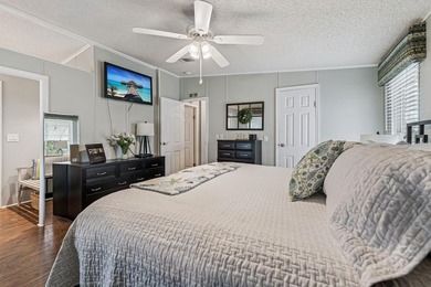 Welcome home to this beautifully updated 2-bedroom, 2-bath on Lake Henry Golf Club in Florida - for sale on GolfHomes.com, golf home, golf lot