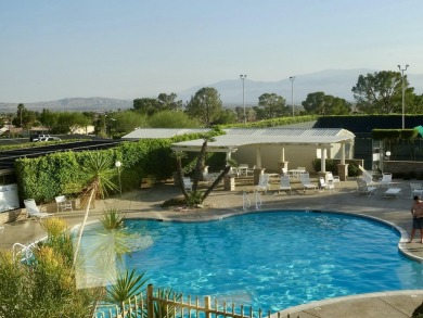 Step into this lovely upstairs unit that host incredible on Mission Lakes Country Club in California - for sale on GolfHomes.com, golf home, golf lot