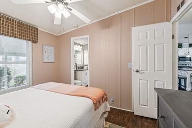 Welcome home to this beautifully updated 2-bedroom, 2-bath on Lake Henry Golf Club in Florida - for sale on GolfHomes.com, golf home, golf lot