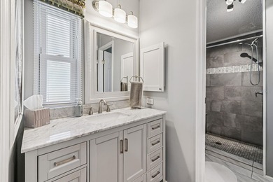 Welcome home to this beautifully updated 2-bedroom, 2-bath on Lake Henry Golf Club in Florida - for sale on GolfHomes.com, golf home, golf lot