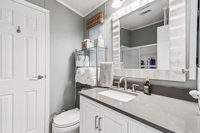 Welcome home to this beautifully updated 2-bedroom, 2-bath on Lake Henry Golf Club in Florida - for sale on GolfHomes.com, golf home, golf lot