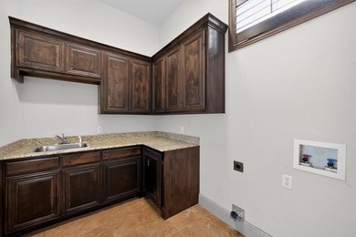 Luxury living awaits at 845 Thomas Crossing Drive, a unique golf on Southern Oaks Golf Club in Texas - for sale on GolfHomes.com, golf home, golf lot