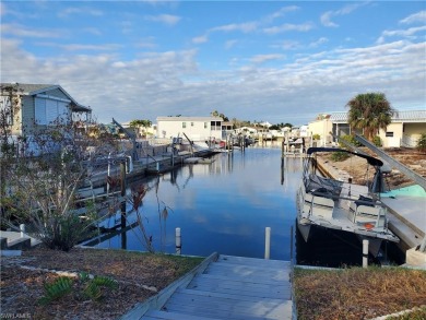 This vacant, ready to build property has Gulf access. Be in on Pelicans Nest Golf Club in Florida - for sale on GolfHomes.com, golf home, golf lot