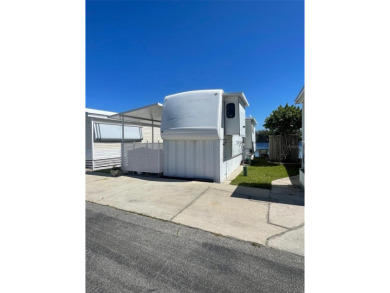 FLORIDA WATERFRONT PROPERTY. AFFORDABLE EASY LIVING. WELCOME TO on Cypress Point RV Golf Club in Florida - for sale on GolfHomes.com, golf home, golf lot