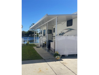 FLORIDA WATERFRONT PROPERTY. AFFORDABLE EASY LIVING. WELCOME TO on Cypress Point RV Golf Club in Florida - for sale on GolfHomes.com, golf home, golf lot