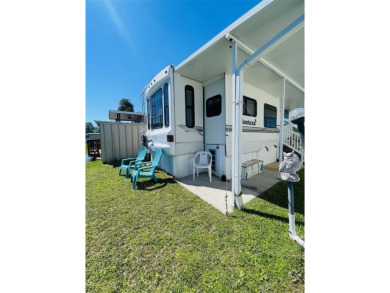 FLORIDA WATERFRONT PROPERTY. AFFORDABLE EASY LIVING. WELCOME TO on Cypress Point RV Golf Club in Florida - for sale on GolfHomes.com, golf home, golf lot