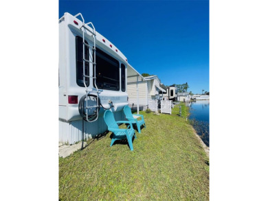 FLORIDA WATERFRONT PROPERTY. AFFORDABLE EASY LIVING. WELCOME TO on Cypress Point RV Golf Club in Florida - for sale on GolfHomes.com, golf home, golf lot