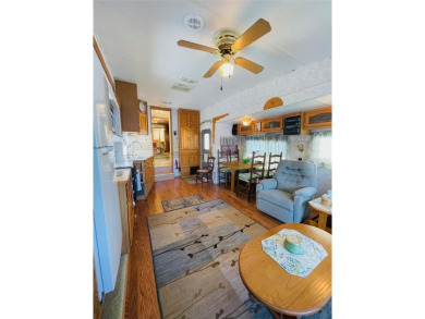 FLORIDA WATERFRONT PROPERTY. AFFORDABLE EASY LIVING. WELCOME TO on Cypress Point RV Golf Club in Florida - for sale on GolfHomes.com, golf home, golf lot