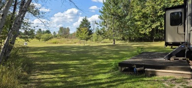 Welcome to Sugar Springs! This beautifully maintained dual lot on Sugar Springs Country Club in Michigan - for sale on GolfHomes.com, golf home, golf lot