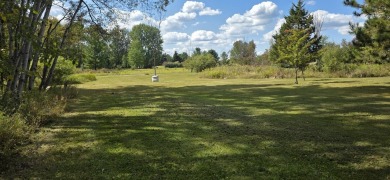 Welcome to Sugar Springs! This beautifully maintained dual lot on Sugar Springs Country Club in Michigan - for sale on GolfHomes.com, golf home, golf lot