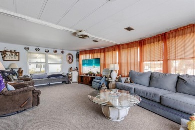 Welcome to Florida Living at Its Finest in Sandal Haven Estates on Lemon Bay Golf Club in Florida - for sale on GolfHomes.com, golf home, golf lot