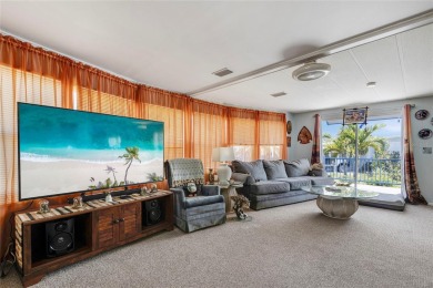 Welcome to Florida Living at Its Finest in Sandal Haven Estates on Lemon Bay Golf Club in Florida - for sale on GolfHomes.com, golf home, golf lot